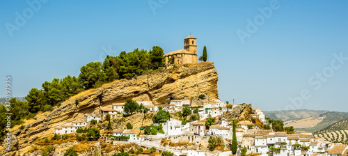 A close-up view of the church above the town of Montefrio, Spain in the summertime
