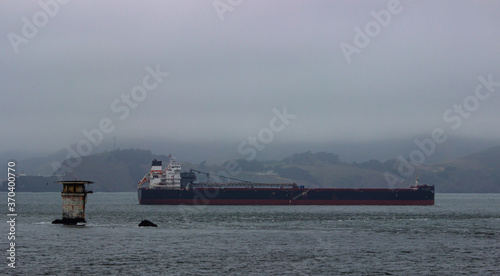 Tanker passing Miles Rocks Lighthouse heading into San Francisco Bay