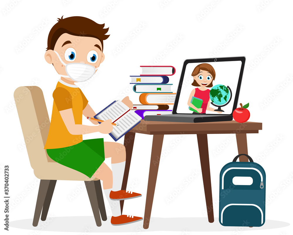 A child in a medical mask sits at a table in front of computer. Study at home A child in a medical mask sits at a table in front of computer. Study at home