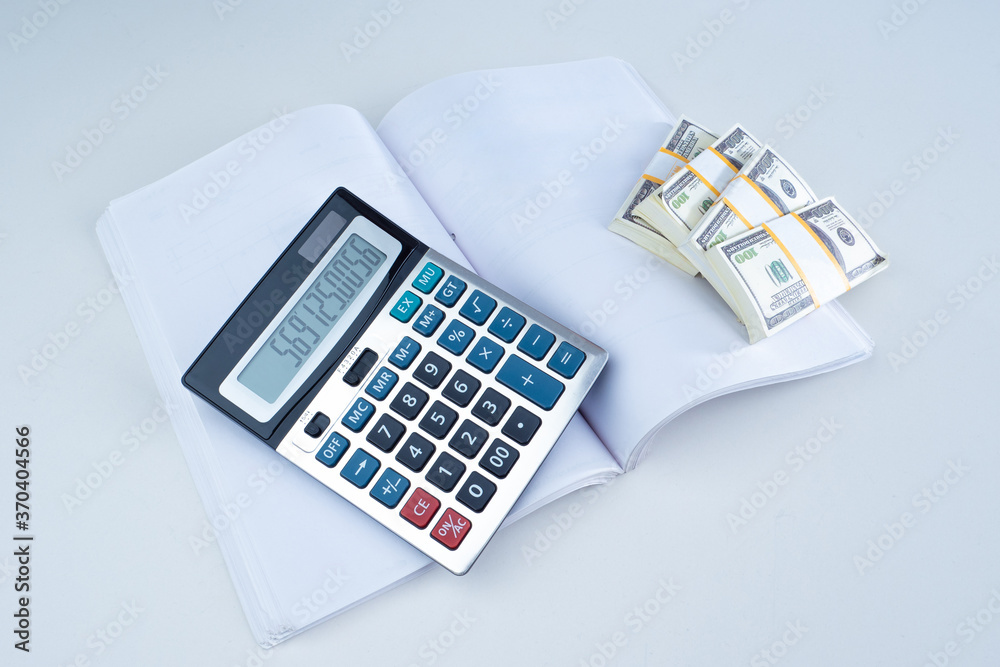 Documents, a calculator, and bundles of dollars. Distribution of the received profit. Investing temporarily available funds. Financial Planning. Budgeting. Distribution of funds by expense items. Documents, a calculator, and bundles of dollars. Distribution of the received profit. Investing temporarily available funds. Financial Planning. Budgeting. Distribution of funds by expense items.