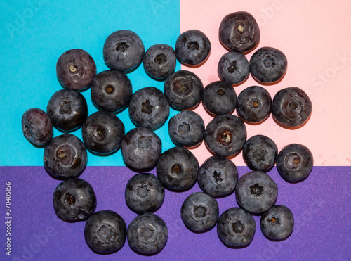 Blueberries on a colored background