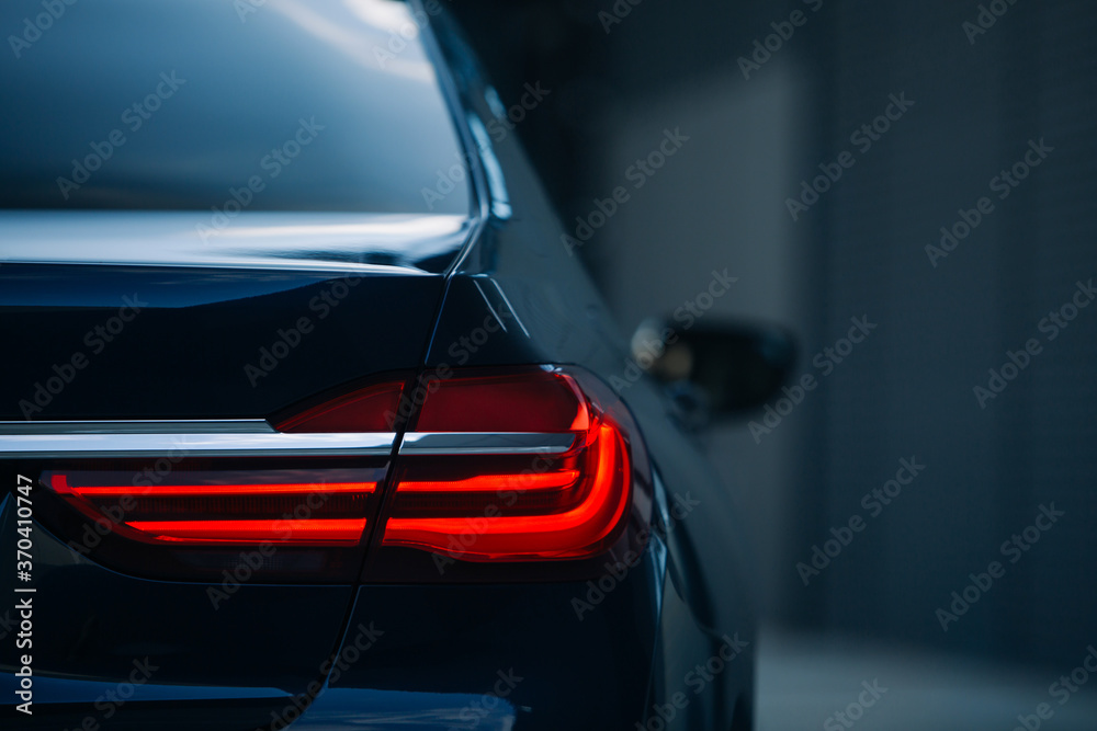 Modern luxury car rear side with taillight lamp