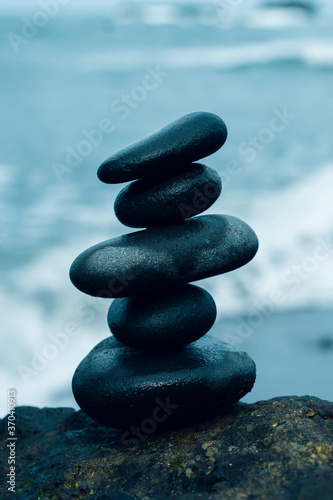 Canvas Print Balancing stones arranged in a pyramid shape