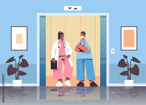 mix race medical workers discussing during meeting in hospital elevator healthcare medicine concept doctors in uniform full length horizontal vector illustration