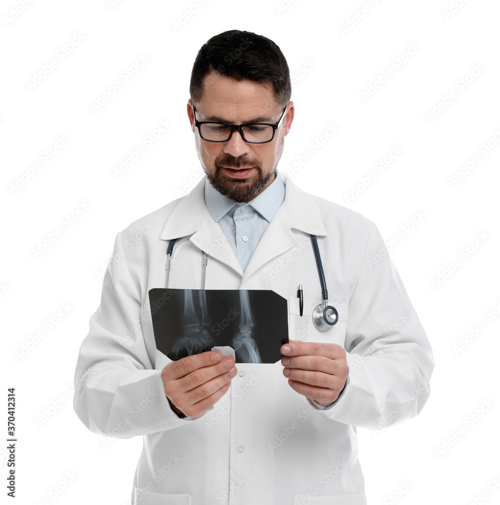 Orthopedist holding X-ray picture on white background Orthopedist holding X-ray picture on white background