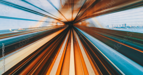 Abstract high speed technology POV train motion blurred concept from the Yuikamome monorail in Tokyo, Japan