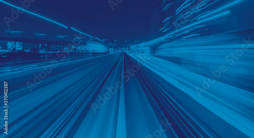 Abstract high speed technology POV train motion blurred concept from the Yuikamome monorail in Tokyo, Japan