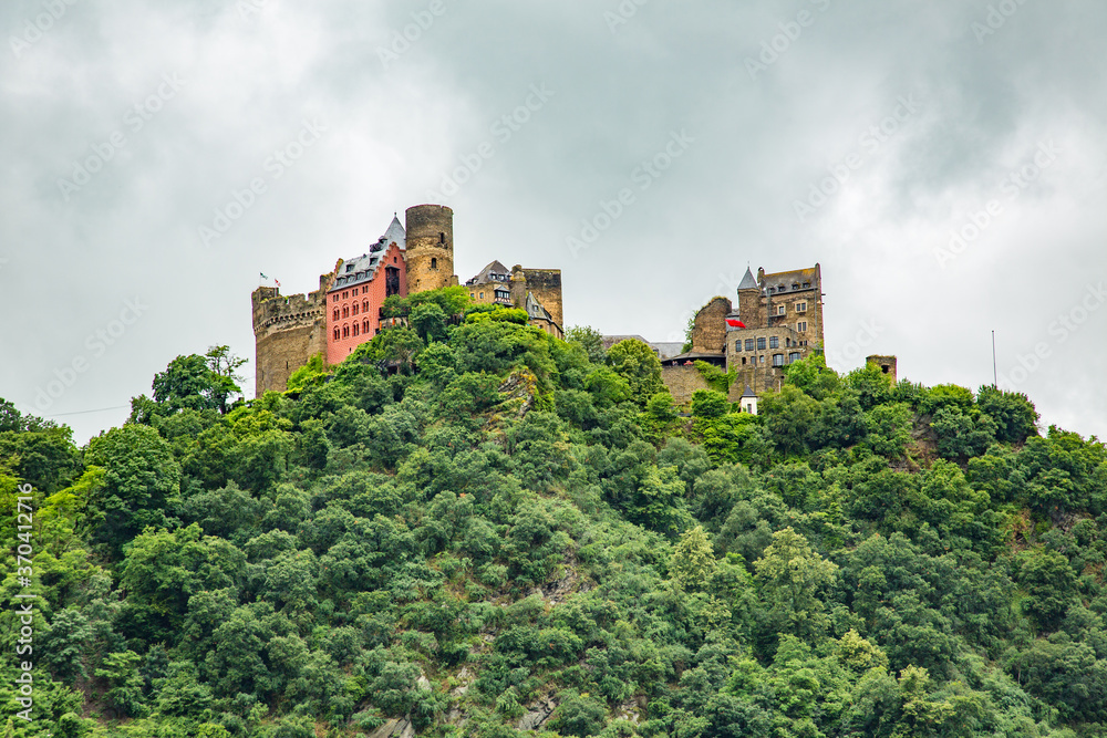 The Schonburg Castle is on a hill above the Rhine River and the village of Oberwesel