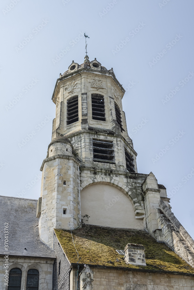 St. Leonard Church with a flamboyant Gothic style facade (fifteenth century) in Honfleur. Large octagonal tower date of 1760. Honfleur is a commune in the Calvados department in northwestern France.