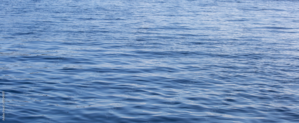 texture of blue sea water surface background texture of blue sea water surface background