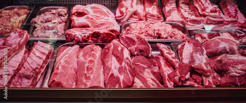 Quality raw meat showcase. Fresh and pink meat collection. Meat shop. Various and good product in the store.