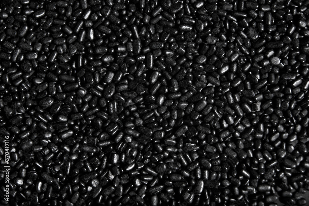 Black sprinkles macro background, halloween theme Black sprinkles macro background, halloween theme