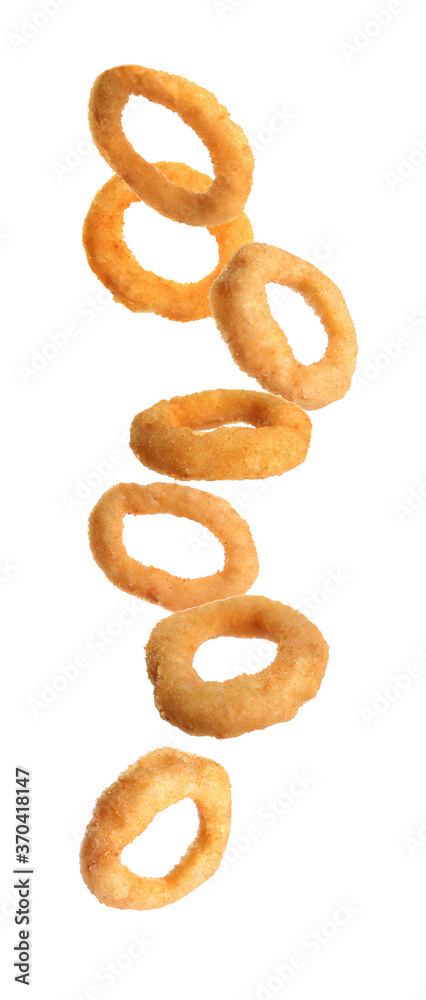 Fried onion rings falling on white background Fried onion rings falling on white background