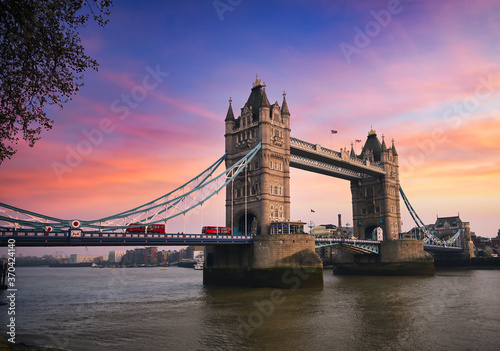 Tower Bridge over the River Thames at sunset in London, UK.