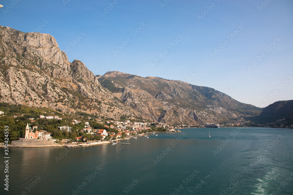 View of the picturesque mountains and towns around the bay of Kotor, including the church of Saint Matthias, Montenegro