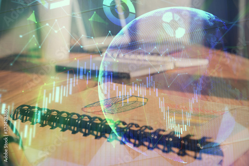 Wallpaper Mural Double exposure of financial graph drawings and desk with open notebook background. Concept of forex market Torontodigital.ca