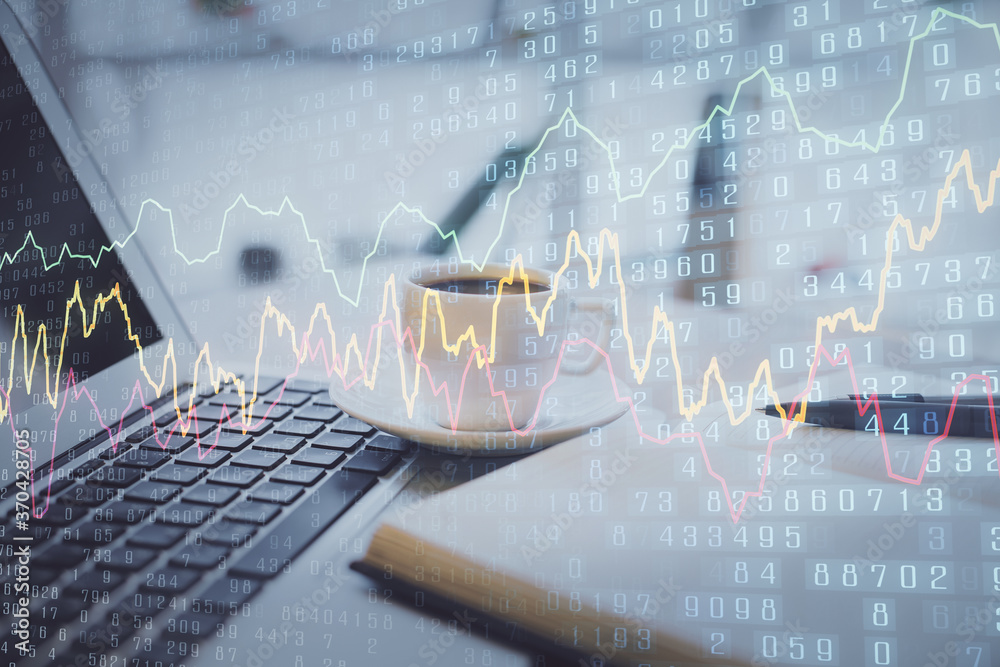 Double exposure of financial chart drawing and desktop with coffee and items on table background. Concept of forex market trading Double exposure of financial chart drawing and desktop with coffee and items on table background. Concept of forex market trading