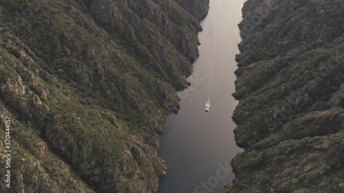 Boat in Sil River Canyon. Landscape in Ribeira Sacra. Galicia,Spain. Aerial Drone Footage photo