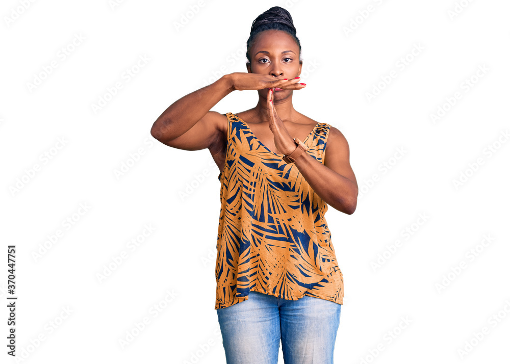 Young african american woman wearing casual clothes doing time out gesture with hands, frustrated and serious face Young african american woman wearing casual clothes doing time out gesture with hands, frustrated and serious face