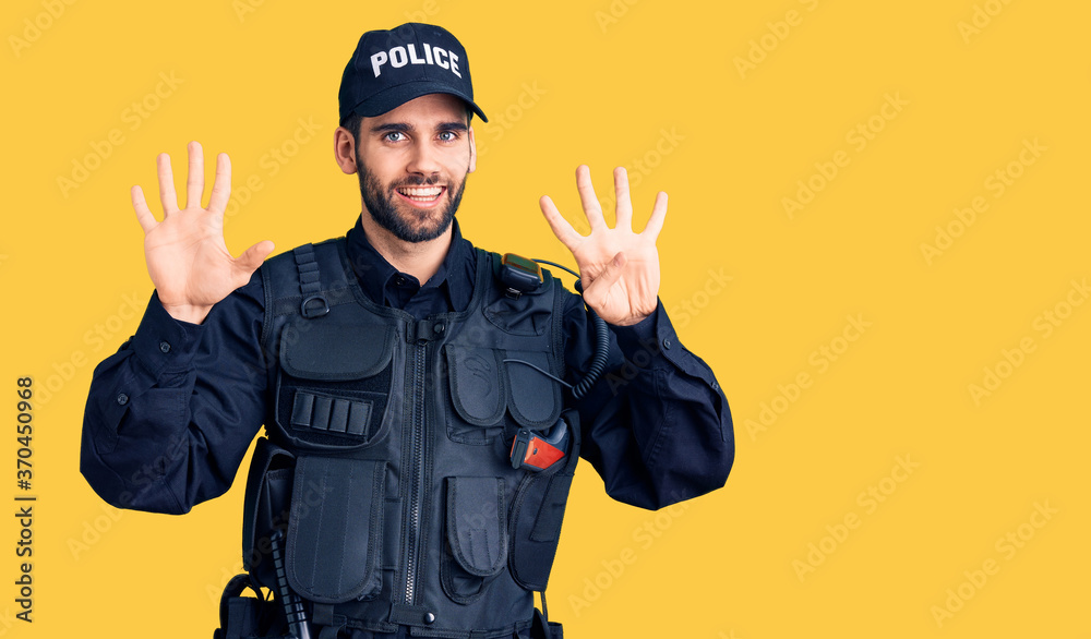 Young handsome man with beard wearing police uniform showing and pointing up with fingers number nine while smiling confident and happy. Young handsome man with beard wearing police uniform showing and pointing up with fingers number nine while smiling confident and happy.
