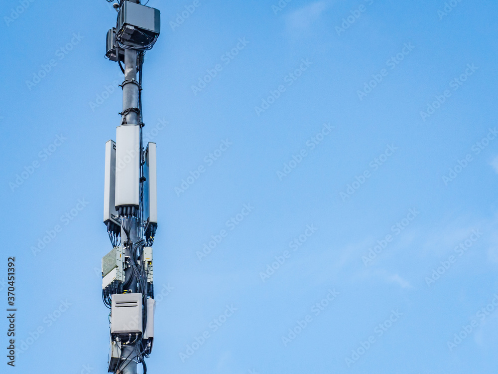 Cellular antennas on a background of clouds Cellular antennas on a background of clouds