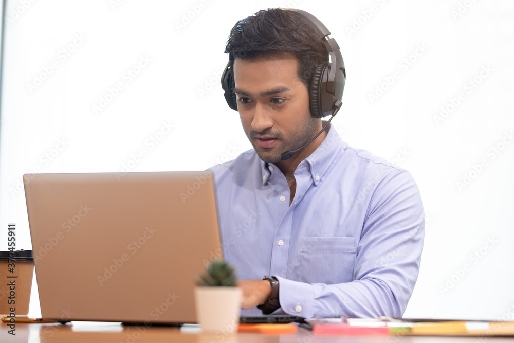 Asian Startup business man meeting with video Conference in office. Asian Startup business man meeting with video Conference in office.
