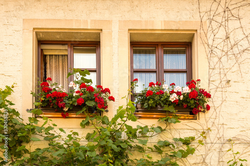 A colorful window in a residential home in Rothenberg, Bavaria, Germany © Bob