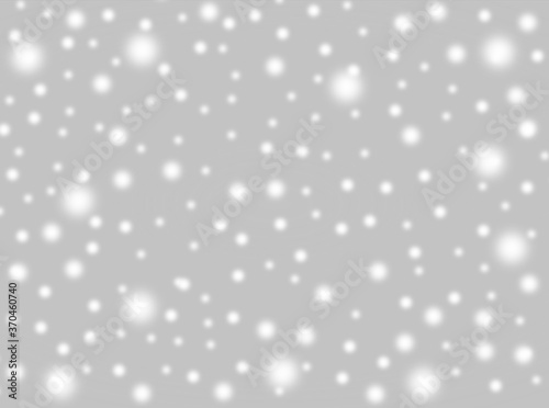 A brilliant gray background with circles. Template for a holiday card with bright and sparkling lights.