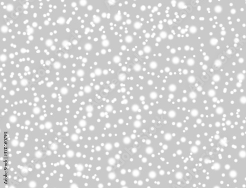 A brilliant gray background with circles. Template for a holiday card with bright and sparkling lights.