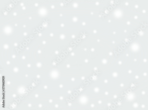 A brilliant gray background with circles. Template for a holiday card with bright and sparkling lights.