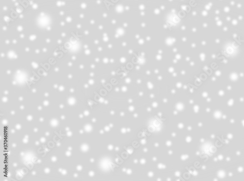 A brilliant gray background with circles. Template for a holiday card with bright and sparkling lights.