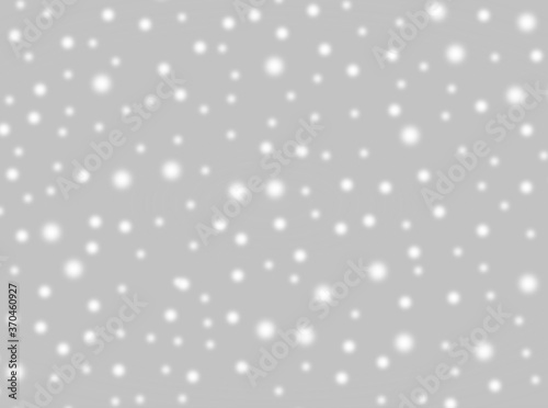 A brilliant gray background with circles. Template for a holiday card with bright and sparkling lights.