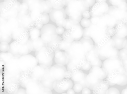 silver bokeh beautiful blurred glitter light on abstract background. grey wallpaper. 