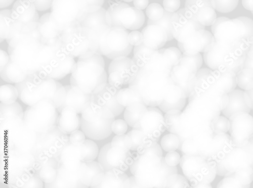 silver bokeh beautiful blurred glitter light on abstract background. grey wallpaper. 