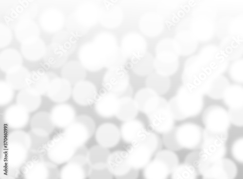 silver bokeh beautiful blurred glitter light on abstract background. grey wallpaper. 