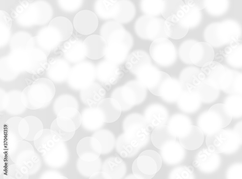 silver bokeh beautiful blurred glitter light on abstract background. grey wallpaper. 