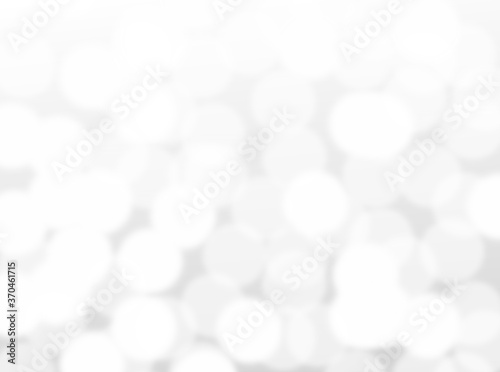 silver bokeh beautiful blurred glitter light on abstract background. grey wallpaper. 