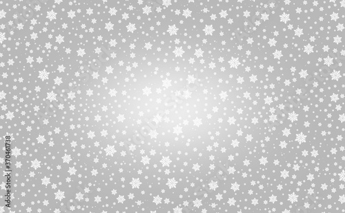 falling snow Christmas background. Subtle flying snowflakes on light grey background. 
