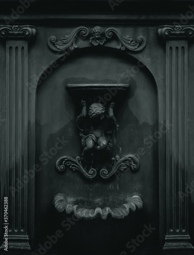 vintage fountain frame on the wall, low key