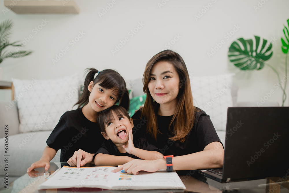 Happy family. Mother and daughter together paint. Adult woman helps the child girl. Happy family. Mother and daughter together paint. Adult woman helps the child girl.