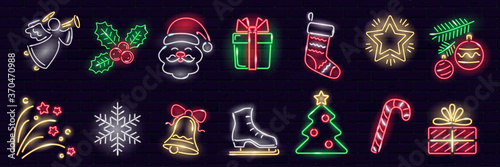 Set of neon Cristmas icons isolated on dark brick wall background.   Gift box, christmas tree, Santa, angel, snowflake, stocking, candy-cane. Xmas, winter, New Year concept. Vector 10 EPS illustration