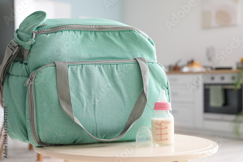 Bag and bottle of milk for ...