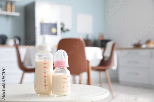 Bottles of milk for baby on...