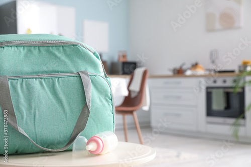 Bag and bottle of milk for ...