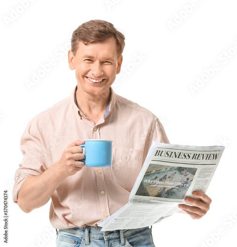 Handsome man with cup of te...