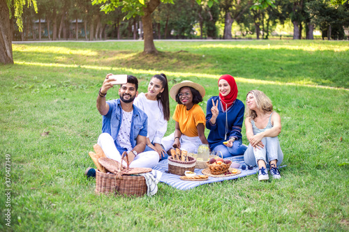 Best friends are on picnic in the park.