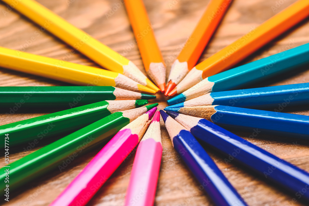 Set of colorful pencils on wooden background - obrazy, fototapety, plakaty 