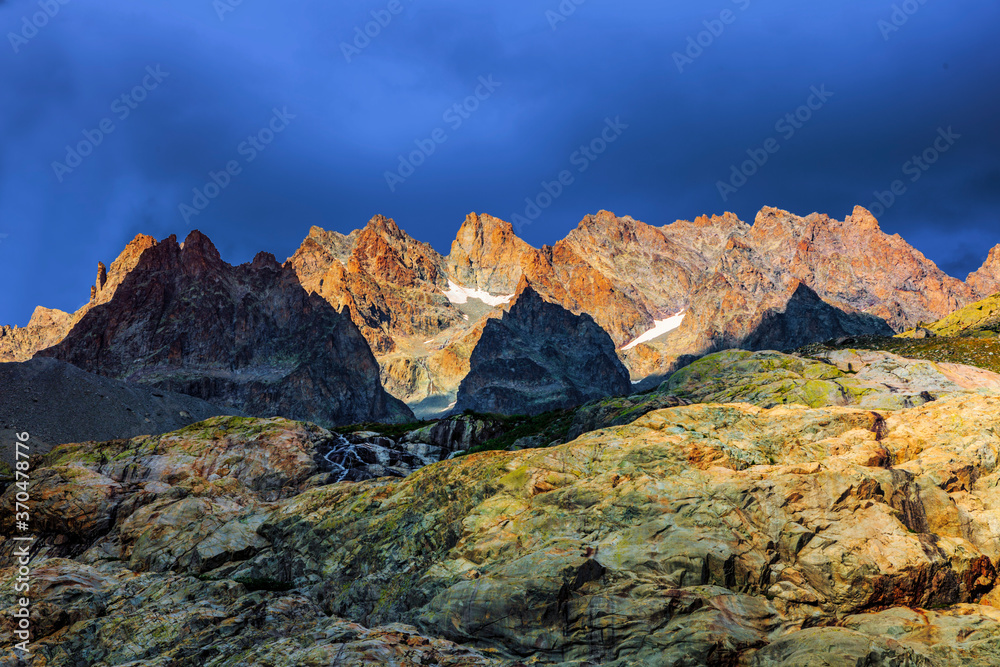 Beautiful view of the alpine peaks at dusk near the Glacier Blanc in the Ecrins Massif in the southern French Alps