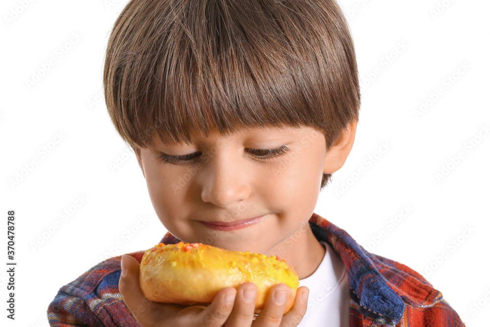 Funny little boy with donut on white background Funny little boy with donut on white background