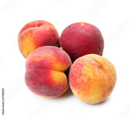 Sweet ripe peaches on white background © Pixel-Shot